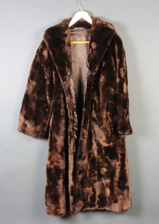 A lady's brown beaver lamb full length coat 