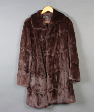 A lady's dark mink quarter length fur coat by Harrods  