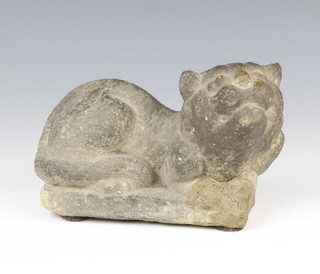 A carved stone figure of a seated "cat" 12cm x 16cm x 9cm 