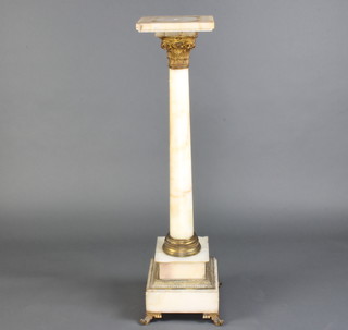 A white veined and gilt mounted turned column on a stepped base with Corinthian capital 110cm h x 25cm d x 25cm w 
