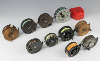 An Air Cel GT-9-S/S centre pin fishing reel, a Kodex centre pin fishing reel, an Intrepid dragon fly reel marked 60, 2 bakelite Alcocks aerial centre pin reels (1 with crack to rim), an Intrepid centre pin fishing reel, do. Superfly reel boxed, a Mustang Shakespeare 45 centre pin reel, wooden star back centre pin fishing reel, wooden centre pin reel and 1 other 