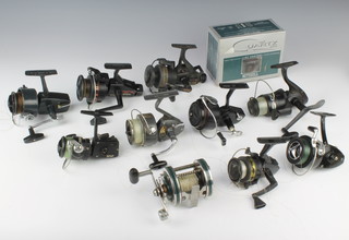 A Daiwa no.750 fishing reel, a Mitchell 208, a Karmann no.41, a Shakespeare 2154, a Bodex 5000, a Mitchell 310 boxed and with paperwork, a Sunshine S7100 and 4 other fishing reels