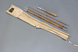 A split cane travel fly fishing rod contained in a Playfair of Aberdeen cloth bag  