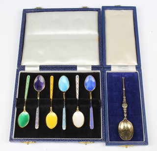 A set of 6 silver and guilloche enamel coffee spoons, Birmingham 1973, cased, together with a silver teaspoon 76 grams