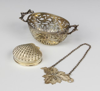An 800 standard 2 handled basket together with a silver sherry label and a shell shaped box 70 grams 