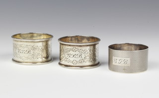 A pair of Victorian silver napkin rings Sheffield 1897, 1 other, 80 grams