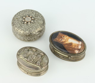A Victorian style circular silver patch box, an oval ditto and an enamelled ditto with a cat