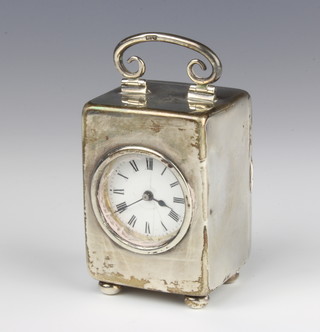 An Edwardian silver cased carriage timepiece with scroll handle on ball feet, London 1907, 9cm 