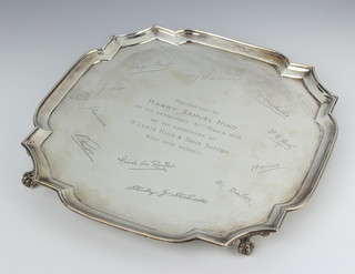 A silver salver with Chippendale rim and presentation inscription and signatures, London 1936, 25cm, maker Richard Woodman Burbridge 534 grams