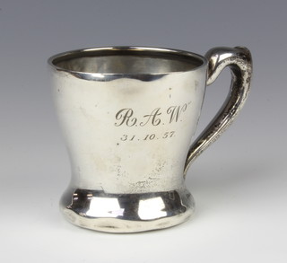 A silver mug with S scroll handle Birmingham 1949 maker Percy Frederick Jackson with presentation inscription, 8cm, 128 grams 