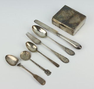 A Victorian silver christening set comprising knife, fork and spoon, Sheffield 1872, a broken cigarette box, a spoon and 2 other spoons