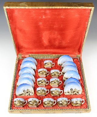 A 12 piece coffee set of cups and saucers decorated with a view of the sphinx in original fitted box 