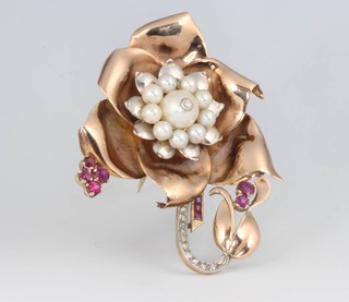 A rose gold, diamond, ruby and pearl floral brooch 60mm x 45mm 