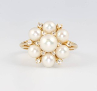 An 18ct yellow gold cultured pearl and diamond floral cluster ring size R 