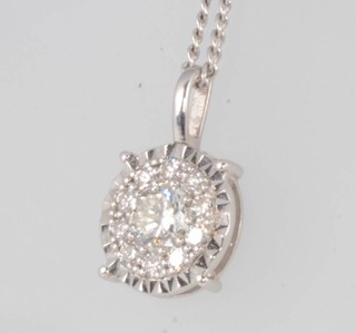 An 18ct white gold diamond cluster pendant 0.5ct on a 9ct white gold chain 