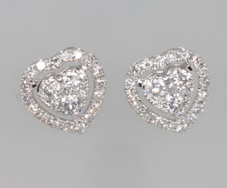 A pair of 18ct white gold heart shaped diamond ear studs approx. 0.6ct