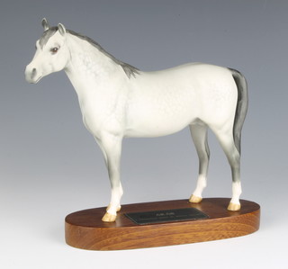 A Beswick Connoisseur figure Arab Bahram, dapple grey, matt finish, raised on a wooden base 19.1cm 