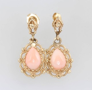 A pair of 14ct yellow gold pear cut coral earrings
