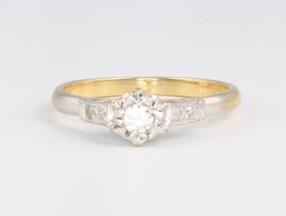 An 18ct yellow gold single stone diamond ring size M 2.7 grams