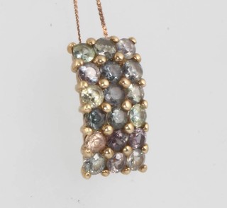 A 9ct yellow gold sapphire and gem set pendant and chain 