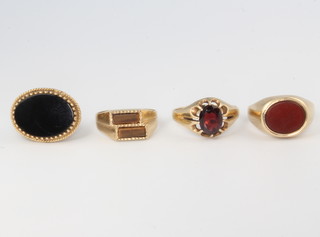 A 9ct yellow gold bloodstone signet ring size O, 2 others and a gold seal 