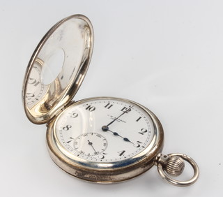 A gentleman's silver and enamelled half hunter pocket watch with seconds at 6 o'clock, the dial inscribed J W Benson London, hallmarked London 1936 