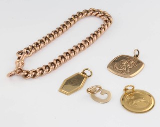 A 9ct yellow gold curb link bracelet, 4 9ct pendants, 16 grams 