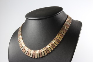 A 9ct 3 colour gold bark finished necklace, 58 grams 