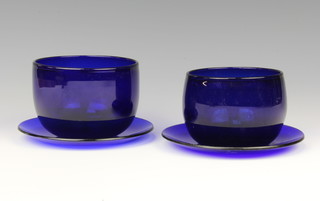 A near pair of Bristol blue glass finger bowls and saucers 