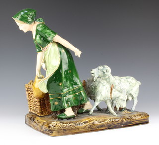 A Continental ceramic vase in the form of a lady and goats beside a wicker basket 34cm 