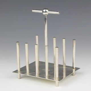 A Christopher Dresser style modern 5 bar toast rack 