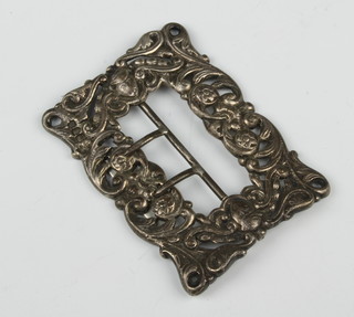 A Victorian cast and pierced silver buckle with masks and scrolls, London 1899, 62 grams, 