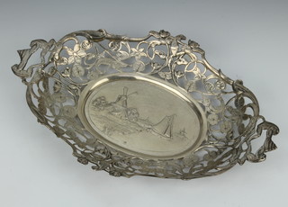 A Dutch pierced and cast silver 2 handled dish decorated with a river landscape with boats and windmills 29cm, 280 grams 