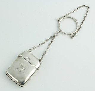 A silver vesta suspended from a ditto chain, Chester 1912 maker Cohen & Charles 