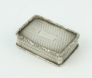 An early Victorian rectangular silver engine turned vinaigrette with gilt floral grill 3cm 