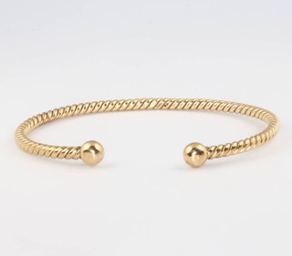 A 9ct yellow gold torque bracelet, 10.3 grams