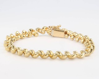 A 9ct yellow gold fancy link bracelet, 12.5grams