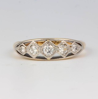 An 18ct yellow gold 5 stone diamond ring with open shank size O 
