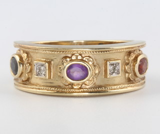 A 9ct yellow gold Etruscan style amethyst and garnet ring size S, 6.7 grams