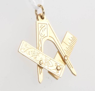 A 9ct yellow gold Masonic pendant, 2 grams 