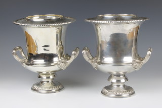 A pair of silver plated 2 handled wine coolers with scroll handles 27cm 