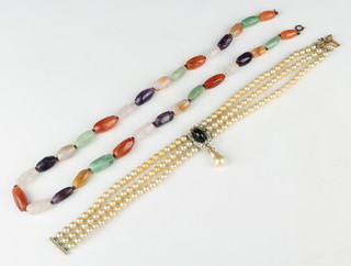 A hardstone necklace and a Ciro imitation pearl choker 