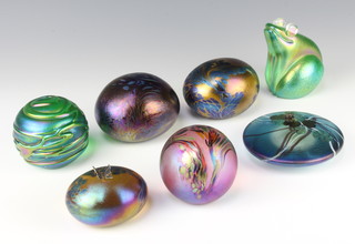 Seven Glasform paperweights comprising 1 shallow decorated with a lily, bulbous ditto decorated with a butterfly, 4 bulbous and 1 frog, all by J Ditchfield 
