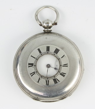A silver half hunter pocket watch with seconds at 6 o'clock 