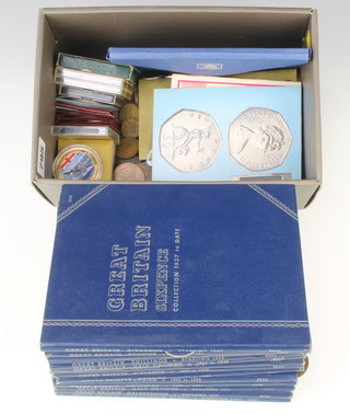 A quantity of commemorative crowns, coins and folders of UK coins 