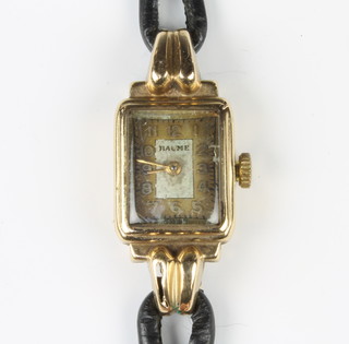 A lady's 1930's 9ct yellow gold Baume wristwatch on a leather strap, in original box 