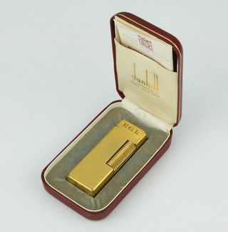 A Dunhill gold plated cigarette lighter boxed 