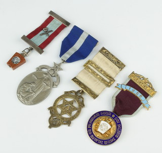 A silver Masonic jewel and 3 others 