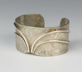 A silver bangle, 103 grams