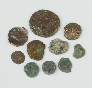 A Roman bronze coin and 9 others